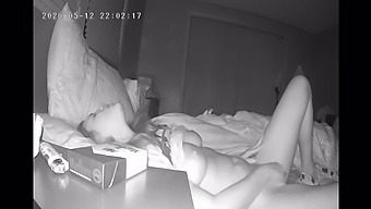 A Reserved Woman Pleasures Herself With Her Fingers Before Sleeping, Captured By A Hidden Camera